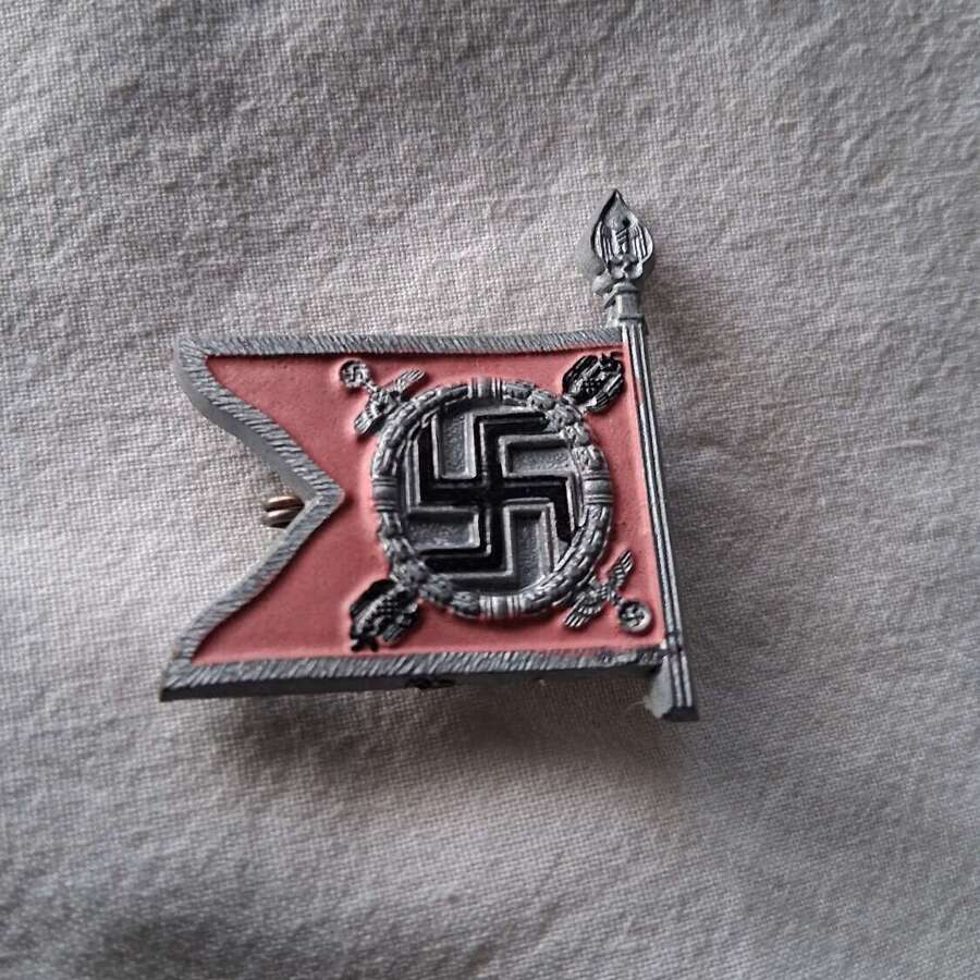 Third Reich day badge priced due to condition