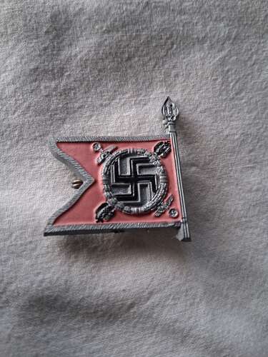 Third Reich day badge priced due to condition