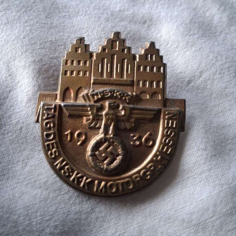 Third Reich day badge priced due to condition