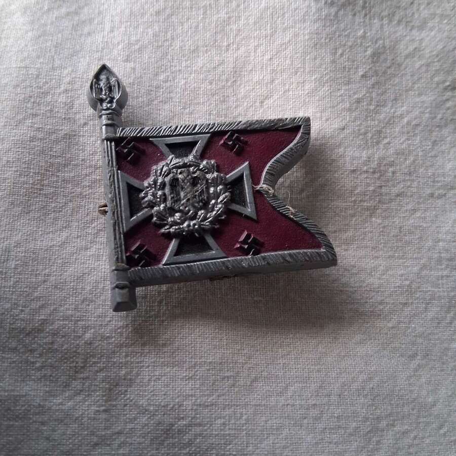 Third Reich day badge priced due to condition